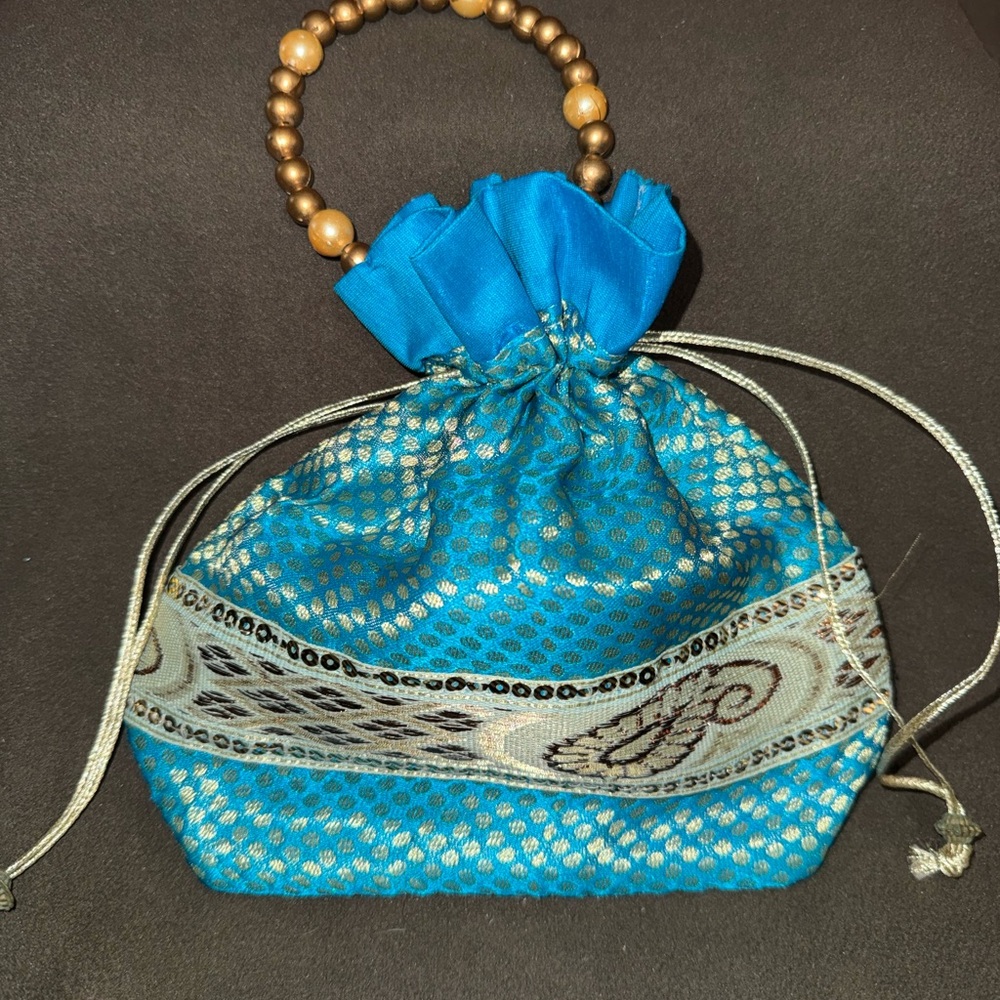 Elegant Blue Silk Drawstring Bag from India